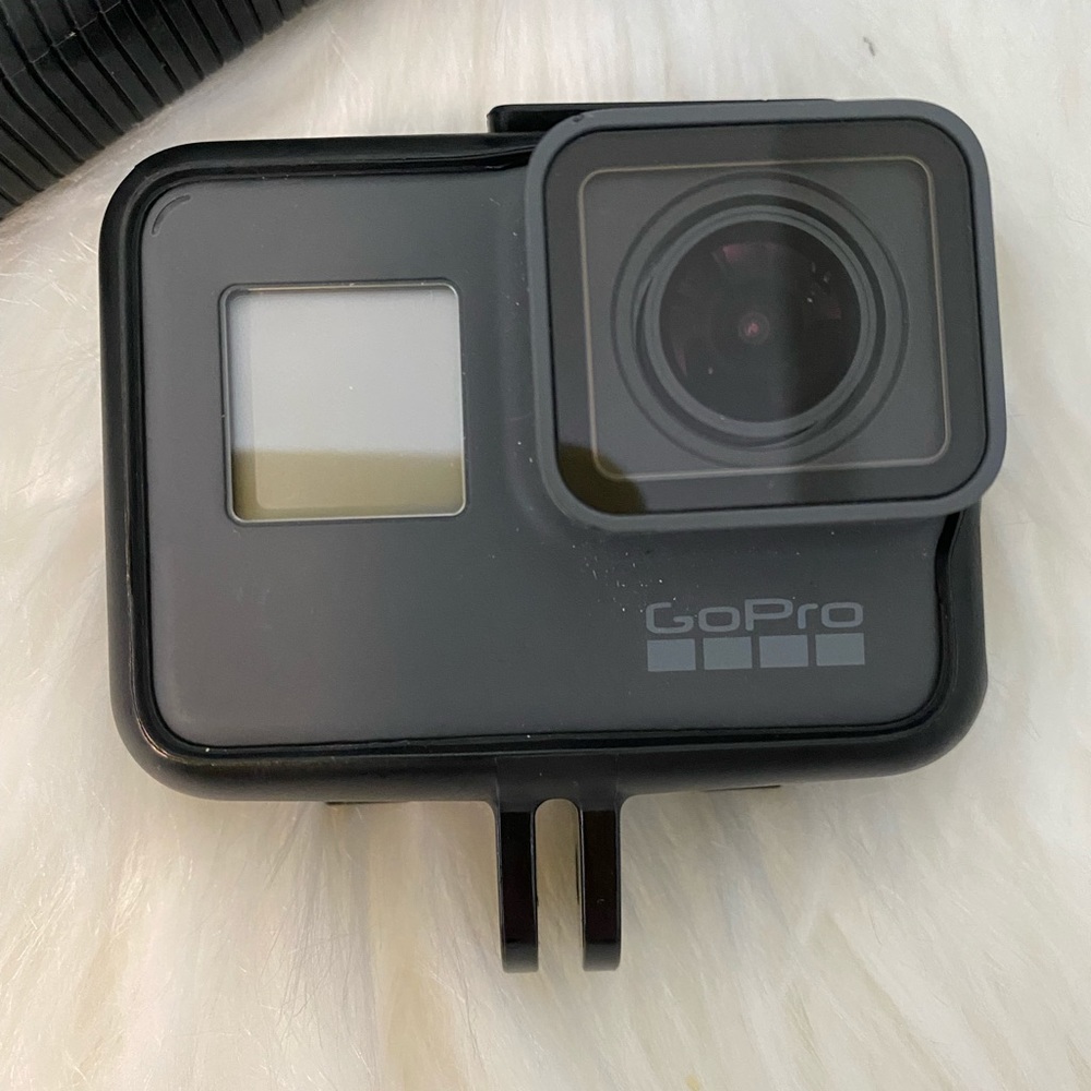Go Pro Hero 5 with accessories and carrying case